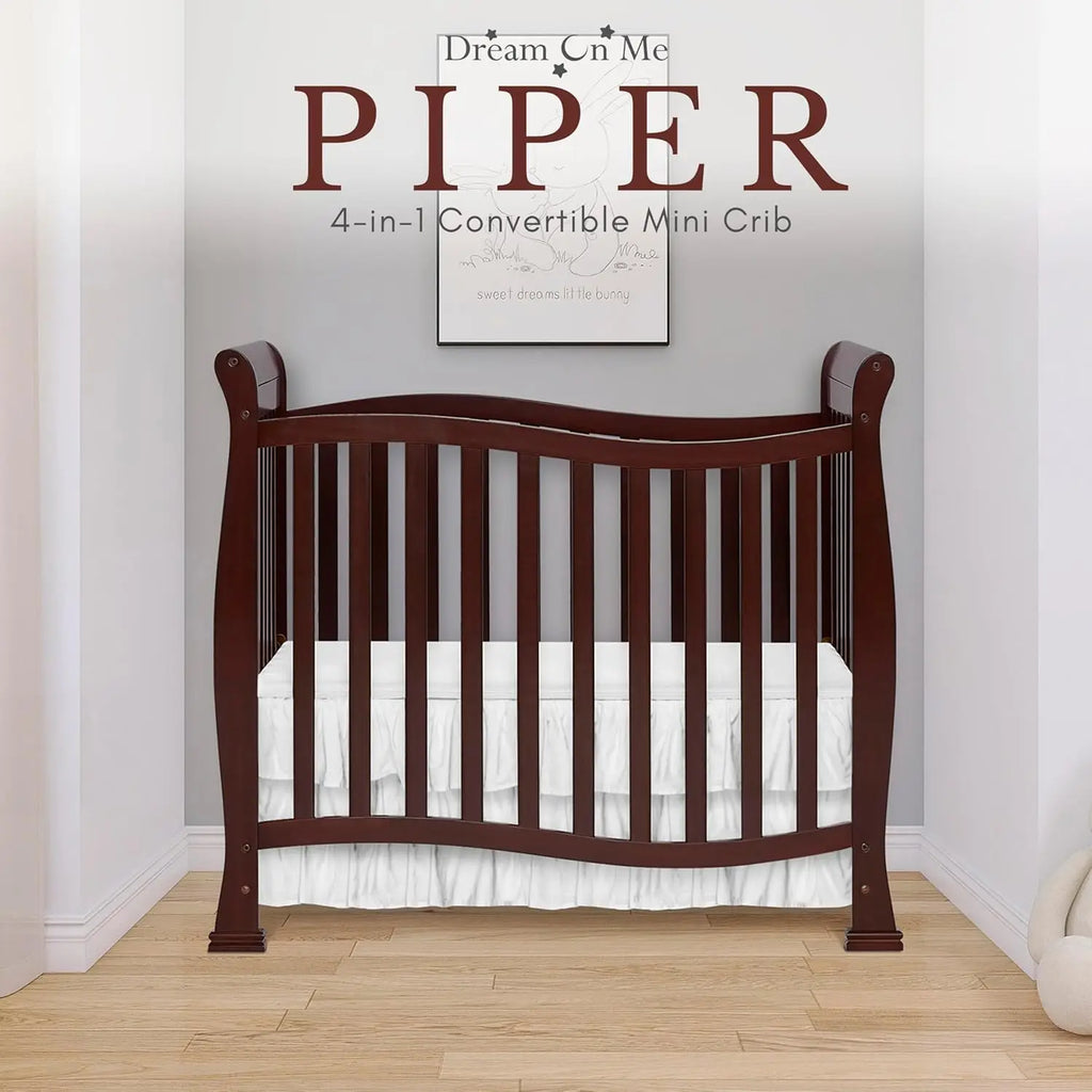 4-in-1 Convertible Mini Baby Crib with Changer & Storage